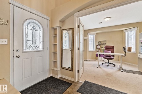 Entryway featuring baseboards and light carpet - 502 Westerra Boulevard, Stony Plain, AB - Indoor