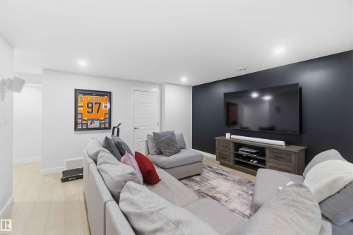 Living area featuring recessed lighting and light wood-style flooring - 2331 71 Street, Edmonton, AB - Indoor