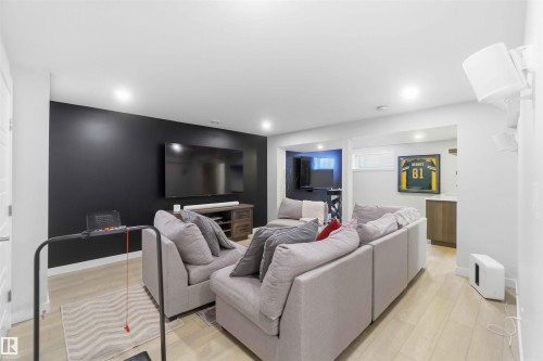 Living room featuring light wood-style floors - 2331 71 Street, Edmonton, AB - Indoor