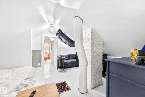 Bedroom with light tile patterned floors - 10523 127 Street, Edmonton, AB - Indoor
