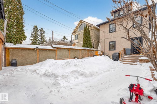 Snowy yard featuring a fenced backyard - 10523 127 Street, Edmonton, AB - Outdoor