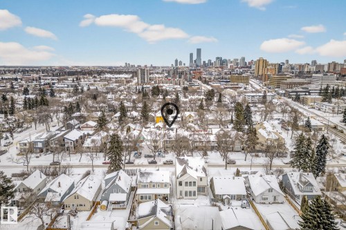 Snowy aerial view featuring a skyline view - 10523 127 Street, Edmonton, AB - Outdoor With View