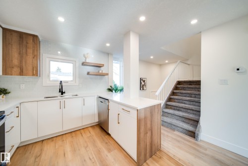 5394 38A Avenue, Edmonton, AB - Indoor Photo Showing Kitchen With Double Sink With Upgraded Kitchen