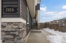 View of snowy exterior with stone siding - 7515 178 Avenue, Edmonton, AB  - Outdoor 