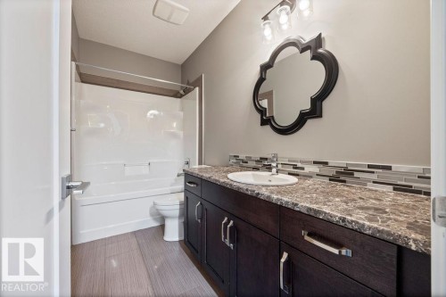 Bathroom with vanity and shower / tub combination - 7515 178 Avenue, Edmonton, AB - Indoor Photo Showing Bathroom