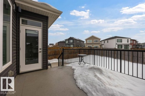 View of patio / terrace with a residential view - 7515 178 Avenue, Edmonton, AB - Outdoor With Exterior