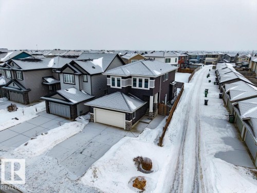 Snowy aerial view featuring a residential view - 7515 178 Avenue, Edmonton, AB - Outdoor With Facade