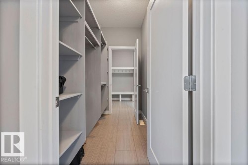View of walk in closet - 7515 178 Avenue, Edmonton, AB - Indoor With Storage