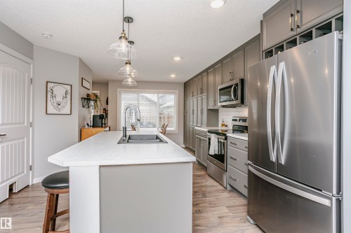 350 Desrochers Boulevard, Edmonton, AB - Indoor Photo Showing Kitchen With Stainless Steel Kitchen With Double Sink With Upgraded Kitchen