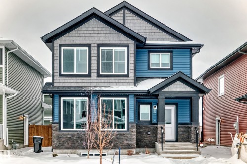 Craftsman inspired home featuring stone siding - 3323 Roy Brown Way, Edmonton, AB - Outdoor With Facade