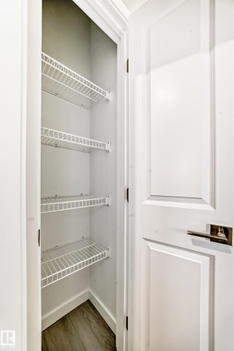 View of closet - 3323 Roy Brown Way, Edmonton, AB - Indoor With Storage