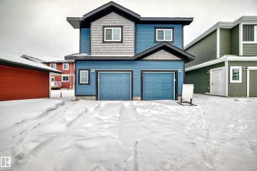 View of front facade featuring an attached garage - 3323 Roy Brown Way, Edmonton, AB - Outdoor
