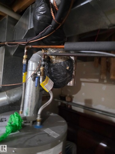 Utility room with water heater - 6731 162 Ave, Edmonton, AB - Indoor Photo Showing Garage
