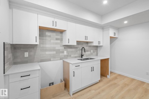 54 Eden Link, Fort Saskatchewan, AB - Indoor Photo Showing Kitchen With Double Sink