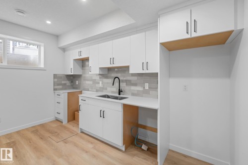 54 Eden Link, Fort Saskatchewan, AB - Indoor Photo Showing Kitchen With Double Sink