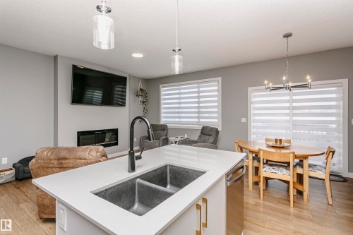 354 Genesis Villa(S), Stony Plain, AB - Indoor Photo Showing Kitchen With Double Sink