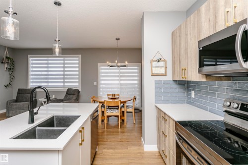 354 Genesis Villa(S), Stony Plain, AB - Indoor Photo Showing Kitchen With Double Sink With Upgraded Kitchen