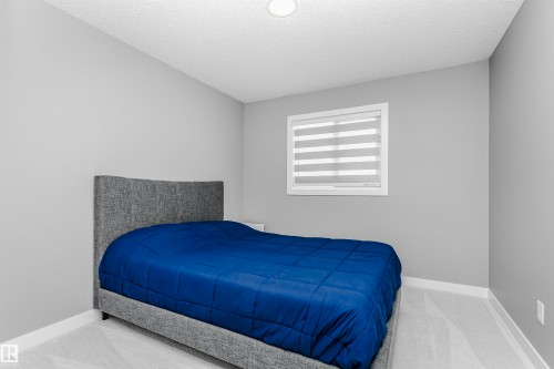354 Genesis Villa(S), Stony Plain, AB - Indoor Photo Showing Bedroom