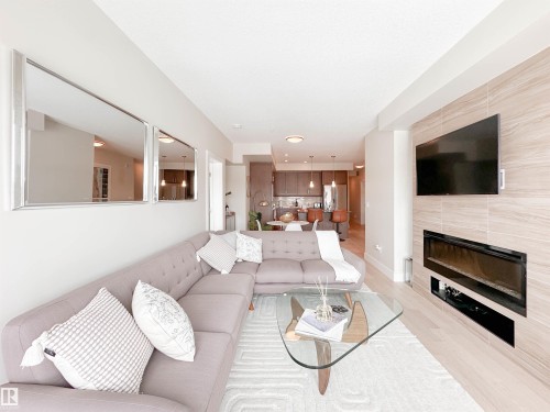 718 200 Bellerose Drive, St. Albert, AB - Indoor Photo Showing Living Room With Fireplace