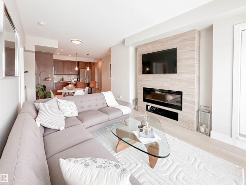 718 200 Bellerose Drive, St. Albert, AB - Indoor Photo Showing Living Room With Fireplace