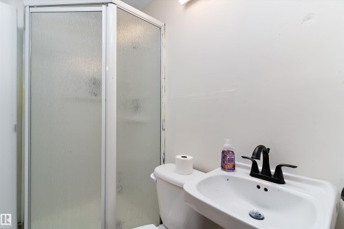 Full bathroom with a sink and a stall shower - 115 Walker Road, Edmonton, AB - Indoor Photo Showing Bathroom