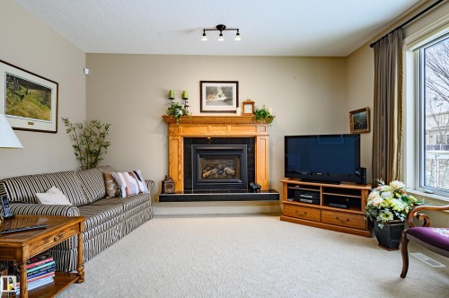 948 Hope Way, Edmonton, AB - Indoor Photo Showing Living Room With Fireplace
