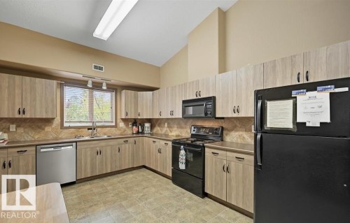 209 8912 156 Street, Edmonton, AB - Indoor Photo Showing Kitchen With Double Sink