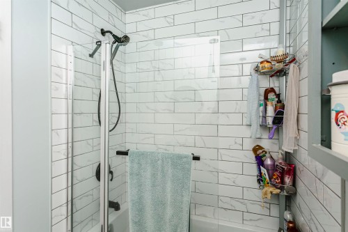 Bathroom featuring enclosed tub / shower combo - 407 8149 111 St S, Edmonton, AB - Indoor Photo Showing Bathroom