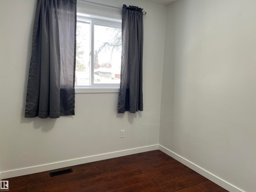 One of 2 Additional Bedrooms adjacent to Primary Bedroom - 10832 163 Street, Edmonton, AB - Indoor Photo Showing Other Room
