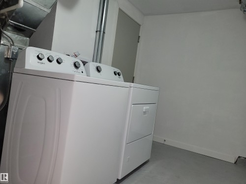 Separate Designated Basement Laundry - 10832 163 Street, Edmonton, AB - Indoor Photo Showing Laundry Room