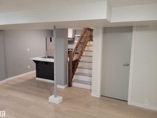 Kitchen and Stairs to Outside Entry - 10832 163 Street, Edmonton, AB - Indoor Photo Showing Other Room