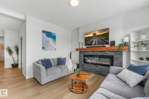 6417 66 Street, Beaumont, AB - Indoor Photo Showing Living Room With Fireplace