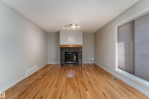 10904 72 Avenue, Edmonton, AB - Indoor Photo Showing Living Room With Fireplace