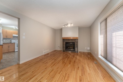 10904 72 Avenue, Edmonton, AB - Indoor Photo Showing Living Room With Fireplace