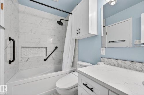 Bathroom featuring vanity and shower / tub combo - 21 Marchand Place, St. Albert, AB - Indoor Photo Showing Bathroom