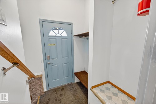 Foyer entrance featuring baseboards and light colored carpet - 21 Marchand Place, St. Albert, AB - Indoor Photo Showing Other Room