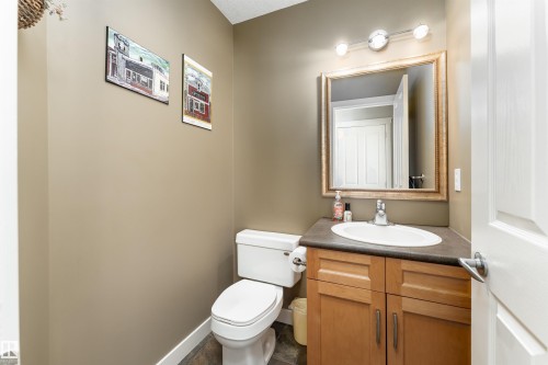 Half bath with vanity and toilet - 10906 72 Avenue, Edmonton, AB - Indoor Photo Showing Bathroom