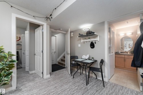 Office area featuring light colored carpet and a textured ceiling - 10906 72 Avenue, Edmonton, AB - Indoor Photo Showing Other Room