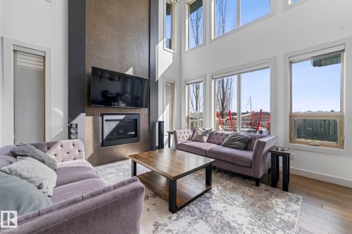 3695 Allan Drive, Edmonton, AB - Indoor Photo Showing Living Room With Fireplace