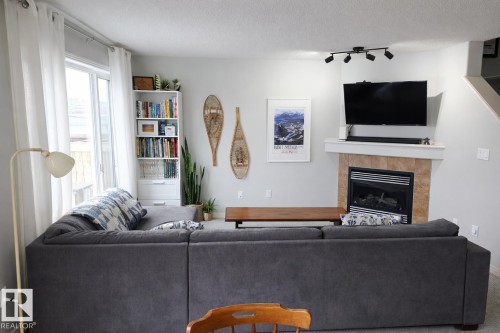 2151 28 Street, Edmonton, AB - Indoor Photo Showing Living Room With Fireplace
