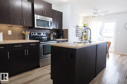 2151 28 Street, Edmonton, AB - Indoor Photo Showing Kitchen With Double Sink