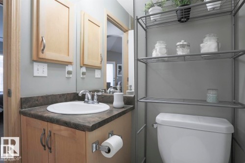 Half bathroom with toilet and vanity - 86 604 62 Street, Edmonton, AB - Indoor Photo Showing Bathroom