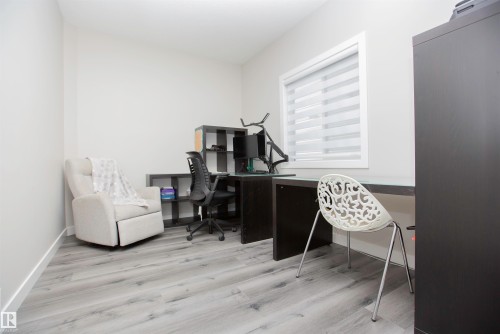 Home office featuring light wood-style flooring and baseboards - 15 Springbrook Wynd, Spruce Grove, AB - Indoor