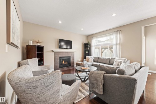 1477 Wates Link Link, Edmonton, AB - Indoor Photo Showing Living Room With Fireplace