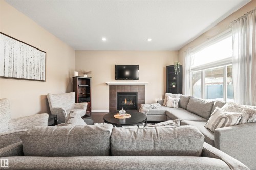 1477 Wates Link Link, Edmonton, AB - Indoor Photo Showing Living Room With Fireplace
