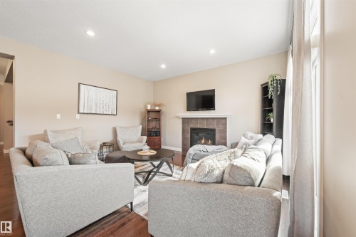 1477 Wates Link Link, Edmonton, AB - Indoor Photo Showing Living Room With Fireplace