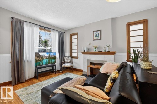 11234 68 Street, Edmonton, AB - Indoor Photo Showing Living Room With Fireplace