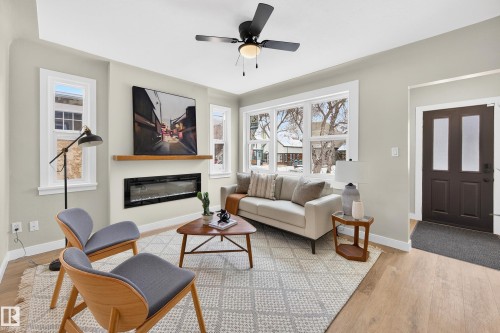 11330 67 Street, Edmonton, AB - Indoor Photo Showing Living Room With Fireplace