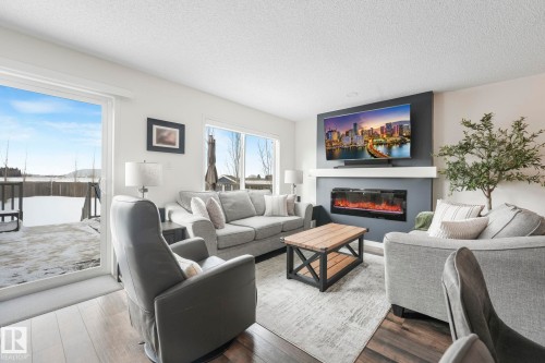 5507 Crabapple Loop, Edmonton, AB - Indoor Photo Showing Living Room With Fireplace
