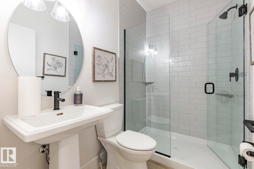 Full bathroom featuring toilet and a shower stall - 6275 180 Avenue, Edmonton, AB - Indoor Photo Showing Bathroom